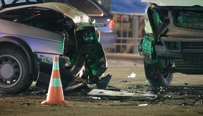 Road accident involving two completely smashed cars